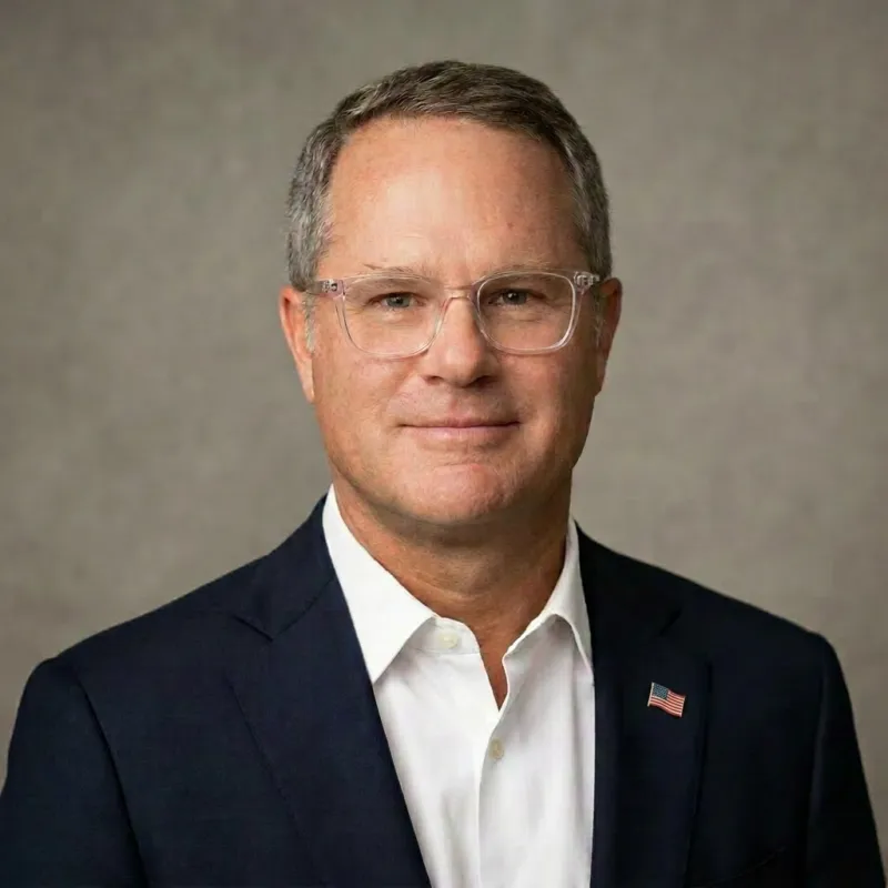 Portrait of Aaron Jacobs, Chief Executive Officer at Fender Financial